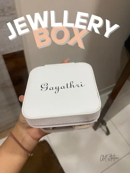 For a more minimalist and elegant look, this white jewellery box was personalized with the name "Gayathri" in a classic script font. It's a timeless piece perfect for travel or home.