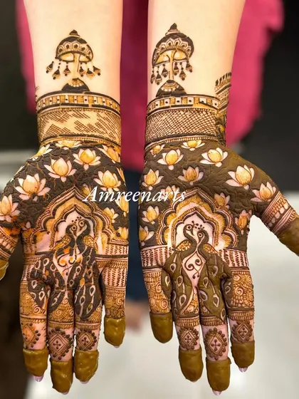 A beautiful design with lotus flowers on the palms and decorative umbrellas on the arms.