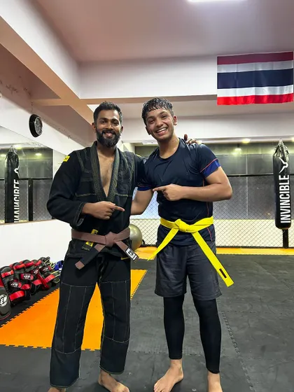 Celebrating my student Almeer's promotion to yellow belt. Recognizing progress and celebrating milestones is a key part of our team culture and keeps everyone motivated on their martial arts journey.