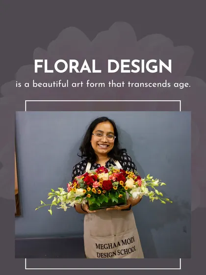 A student holds her beautiful, horizontally-designed arrangement. This showcases the variety of styles and techniques my students learn.