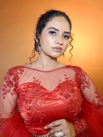 This glossy, waterproof makeup look is perfect for a party or reception. The skin is luminous, and the eyes have a beautiful sheen. This was a look I demonstrated for my students.