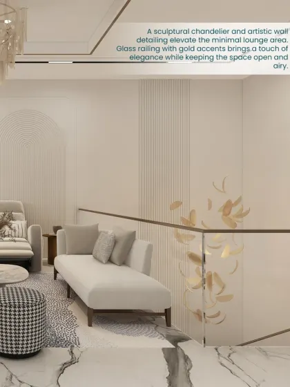 A sculptural chandelier and artistic wall detailing elevate this minimal lounge area. The glass railing with gold accents keeps the space feeling open and airy.