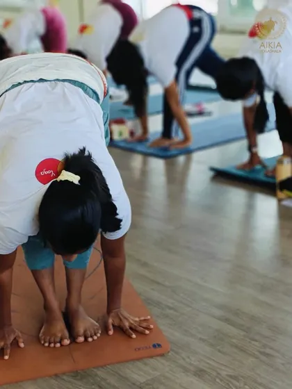 In our TTC, we focus on foundational postures like Uttanasana (Standing Forward Bend). This helps future teachers understand how to guide students in releasing tension from the spine and hamstrings safely and effectively.