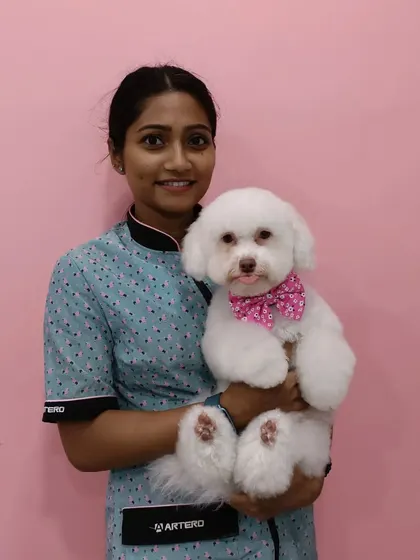 Me with Sugar the Toy Poodle. She's a perfect little model.