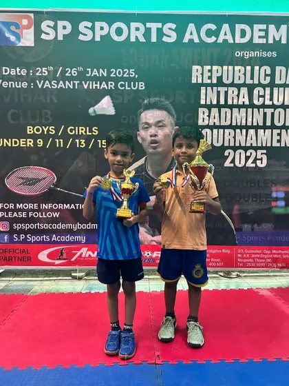 The U-9 boys finalists proudly displaying their trophies and medals after a hard-fought match. The future of our academy is bright!