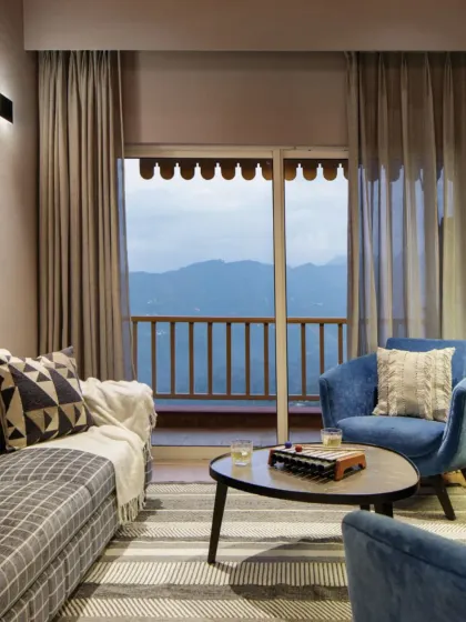A shot celebrating our 10k followers milestone, featuring the living room at Valley of Dreams. The view of the mountains from the balcony perfectly captures the aspirational and soulful nature of our design work.
