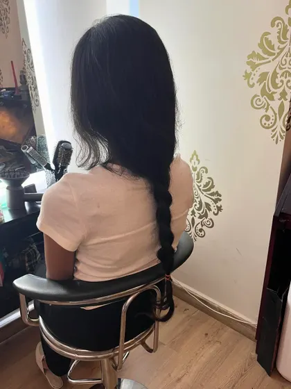Aleena's long braid before she donated 12 inches of hair.