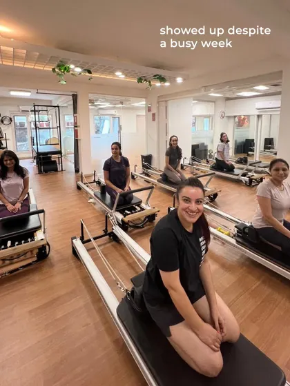 Various shots of members and instructors in action during our dynamic Reformer Pilates classes.