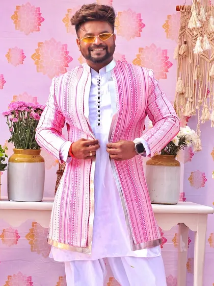 "Style should breathe elegance." This pink striped indo-western outfit is another one of my designs.