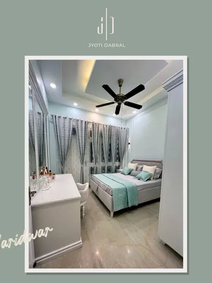 A full view of the Haridwar bedroom, showing the seamless integration of the bed, dressing table, and wardrobe. The consistent color scheme makes the room feel spacious and serene.