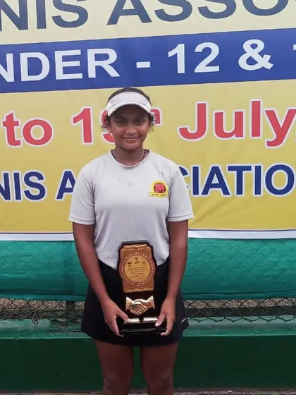 Our player Eshita with her first U-14 Super Series finalist trophy from the tournament in Guwahati. A proud milestone for her and the academy.