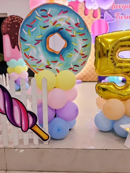 A detail shot of the giant donut and popsicle props.
