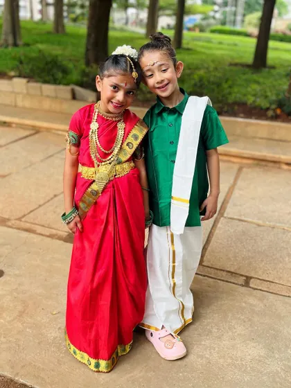 Adorable friends posing in their traditional best. Our studio embraces and celebrates all cultures.