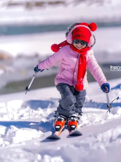My youngest daughter trying out skiing for the first time. Action shots like this are a great way to capture the fun and excitement of a family holiday.