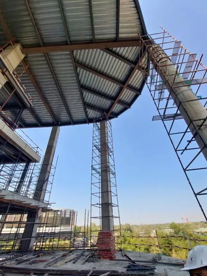 On-site construction progress of the Narmada project. This image shows the steel framework taking shape, giving a sense of the building's scale and structural complexity.