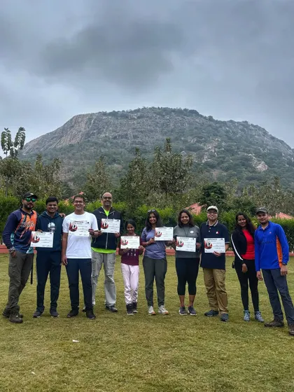 A proud team holding their completion certificates after the Makalidurga trek. We believe in recognizing effort and celebrating the successful completion of a challenge.