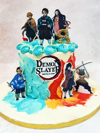 We capture the action of the popular anime with this Demon Slayer theme cake. Featuring key characters like Tanjiro and Nezuko set against a backdrop of abstract buttercream art, this cake brings the world of demon slaying to your celebration with artistic flair.