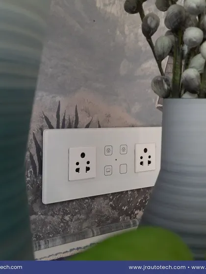 We combine smart technology with everyday practicality. This custom white panel integrates standard 6A electrical sockets with smart touch controls for lights and fans, providing a clean, all-in-one wall unit that eliminates clutter.