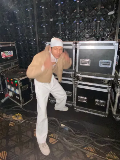 Getting hyped up backstage. This is where the energy starts building before we bring it to the audience.