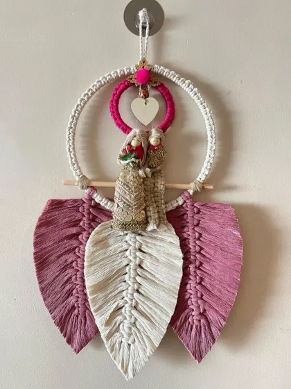 This close-up shows the detail of the couple dolls and the heart charm. I can customize the colors to match wedding themes or a couple's favorite shades.