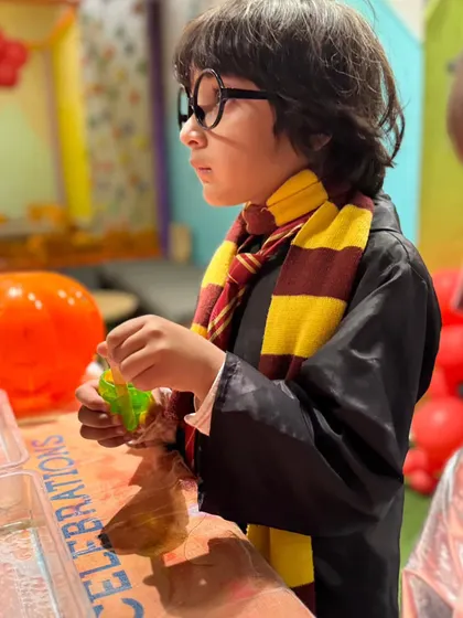 Even Harry Potter takes a break from casting spells to join in on the slime-making workshop. The kids are always so focused during these activities.
