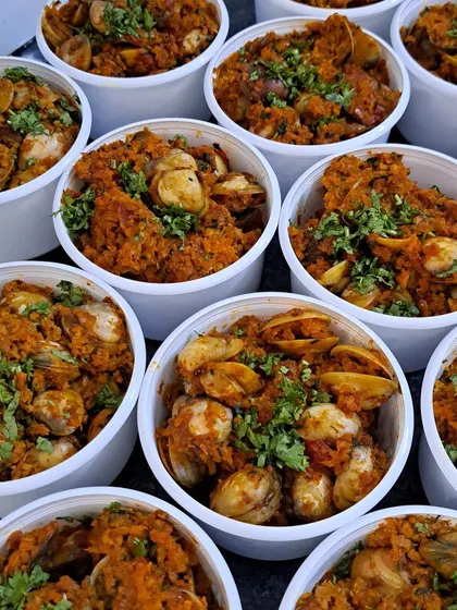 These are fresh cockles, or 'khube', cooked in a delicious Goan sukka masala. This dish is a Saturday special that often sells out quickly, a testament to its irresistible flavor.
