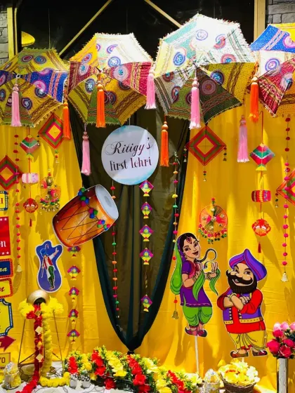 This was for a baby's first Lohri celebration! I designed a complete Punjabi-style selfie station with phulkari umbrellas, dhol cutouts, and lots of bright, festive colors to capture the fun and traditional vibe of the occasion.