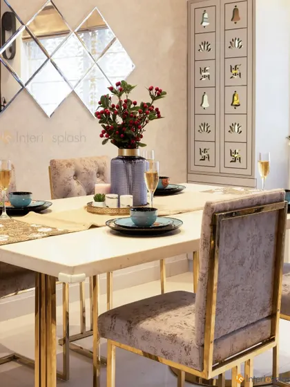 Another angle of the dining area, showing the tufted chairs and the nearby puja unit. This demonstrates how we integrate different functional and spiritual spaces within a home.