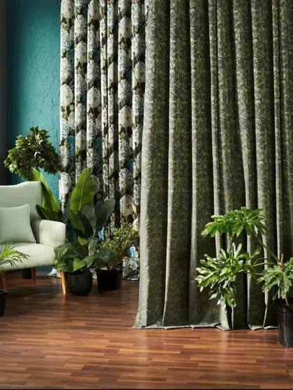 A room filled with plants and botanical-print curtains. This image fully immerses the viewer in the 'Deep Secrets of the Forest' theme, creating a lush, green sanctuary indoors.
