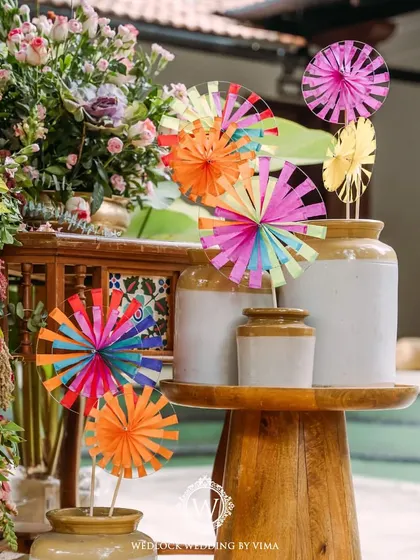 Handcrafted, colorful pinwheels were a key element in our carnival-themed Mehendi. They lined the walkways and were used in decor arrangements, adding a playful and vibrant touch.