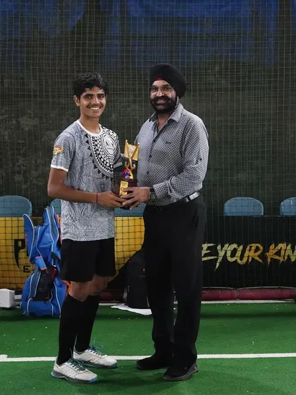 Celebrating success is part of our journey. Here, one of our talented players is recognized with a trophy at the Sunday Sultans Hockey Carnival, a proud moment for our entire team.