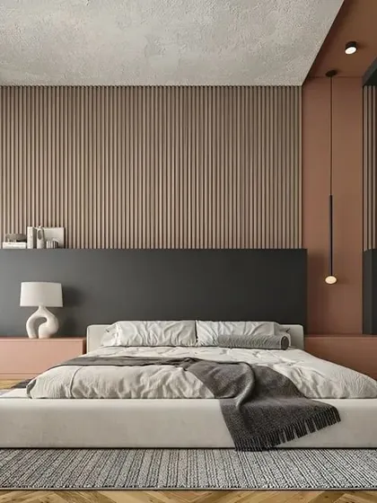 A minimalist bedroom design with a focus on texture and color blocking. The room features a fluted wood-panelled wall, a low-profile bed, and a calm, earthy color palette for a serene atmosphere.