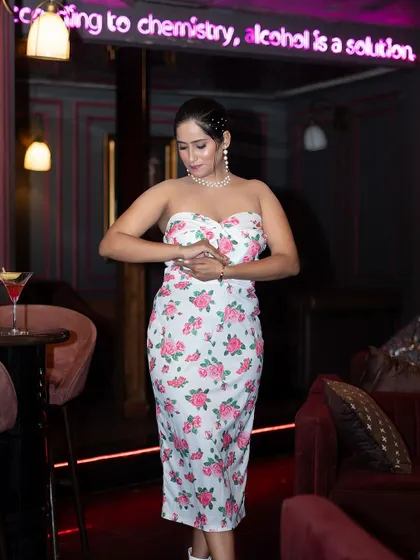 A candid-style moment from the cafe shoot, showing a natural and elegant pose. Capturing these in-between moments adds authenticity to a lifestyle gallery.