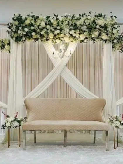I specialize in creating elegant and sophisticated stage environments. This clean, modern setup features premium seating, soft drapery, and classic chandeliers, perfect for award ceremonies, corporate galas, or formal receptions.