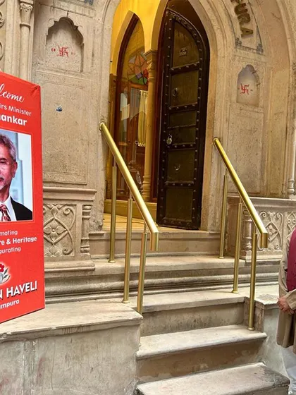 The entrance to the Golden Haveli, prepared to welcome our esteemed guest, Minister Dr. S. Jaishankar, for the inauguration. The restored facade showcases intricate carving and traditional design elements.