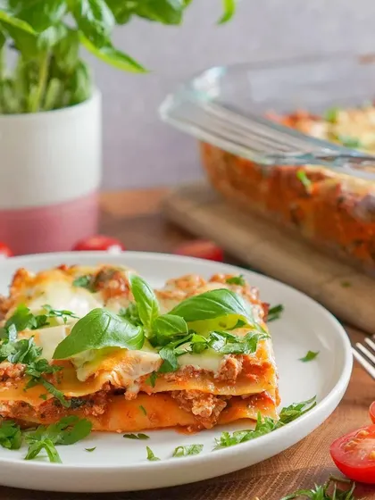 A perfect slice of our homemade lasagna, rich with cheese and a savory meat sauce. This classic comfort dish is always a welcome addition to any buffet menu.