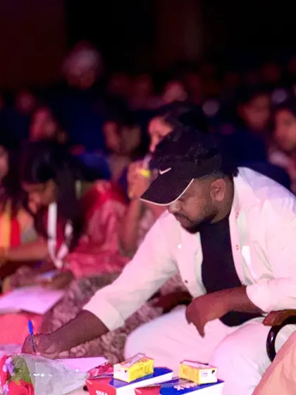 This is me in my element, focused on the performance and taking detailed notes. As a judge, I believe in a structured evaluation, ensuring every ounce of effort from the performers is seen and scored fairly 💫