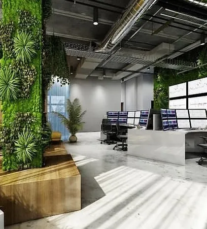 A modern office interior that incorporates biophilic design with extensive vertical gardens and planters. This rendering illustrates a healthy and vibrant workspace concept.
