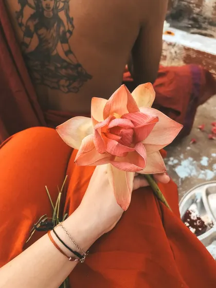 The lotus flower is a powerful symbol in yoga. It grows from the mud but blossoms into a beautiful, pure flower. This represents our own spiritual journey of rising from our challenges to realize our divine nature.