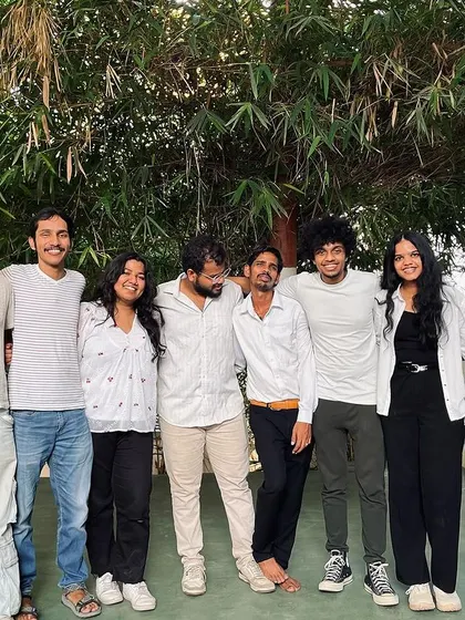 A more formal group photo of the departing interns.