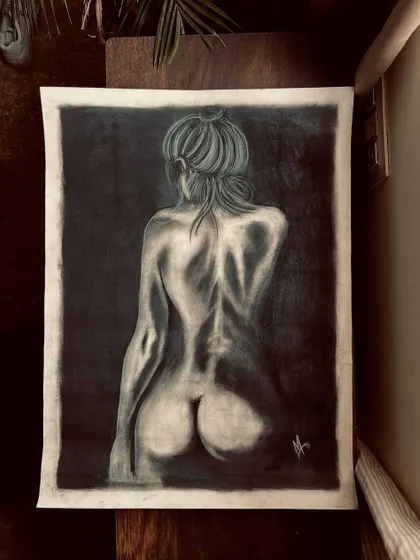 Using charcoal, I explore the human form, focusing on light, shadow, and emotion. This is a personal piece that reflects my belief that art reveals the soul.