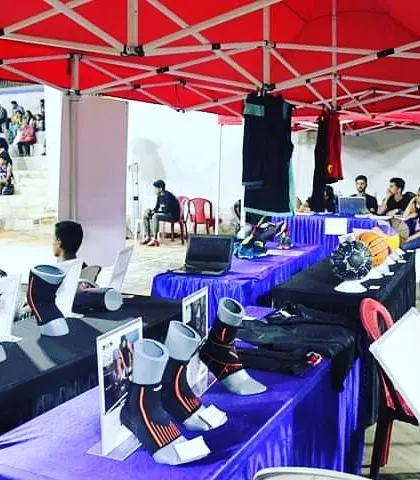 A duplicate shot of the merchandise and display booth at the tournament.