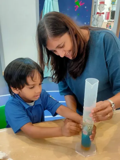This one-on-one interaction is key to our teaching philosophy, ensuring each child grasps the concept and feels supported in their learning journey.