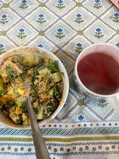 A client's meal of a hearty salad with a cup of herbal tea. This is part of a plan that has helped her lose 14 kgs to date.
