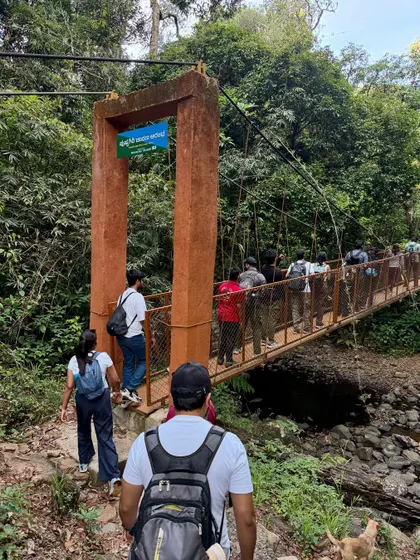 Crossing a hanging bridge deep inside the Pushpagiri Wildlife Sanctuary. This is just one of the many exciting parts of the Kumara Parvatha trek before the real climb begins.