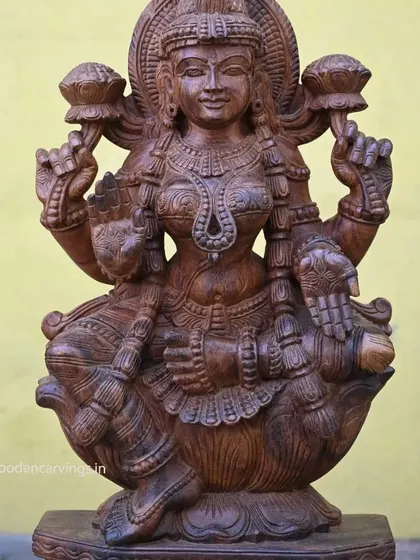 A close-up of the 30.5-inch Mahalakshmi, focusing on the delicate carving of her jewelry and face.