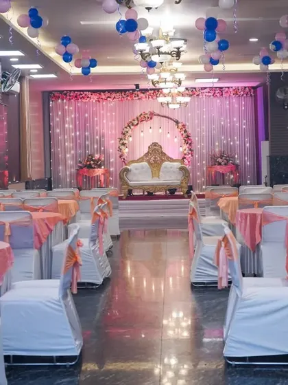 The full view of a beautifully decorated banquet hall for a family celebration. We can photograph the venue before guests arrive to capture every detail.