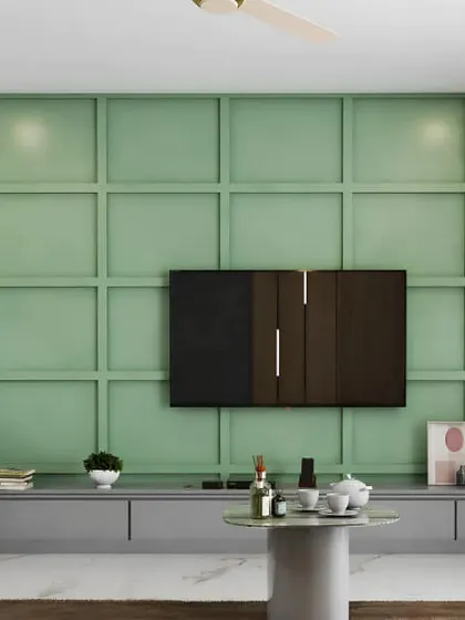 A bold design featuring a full accent wall in sage green with a grid pattern. The low-profile grey media console spans the width of the wall, offering extensive storage and a clean, contemporary look.