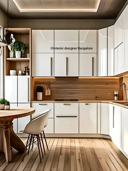 I design spaces that integrate seamlessly with your lifestyle. This L-shaped kitchen incorporates a cozy dining nook, using high-gloss white cabinetry and warm wood floors to create a bright, open, and welcoming eat-in kitchen.