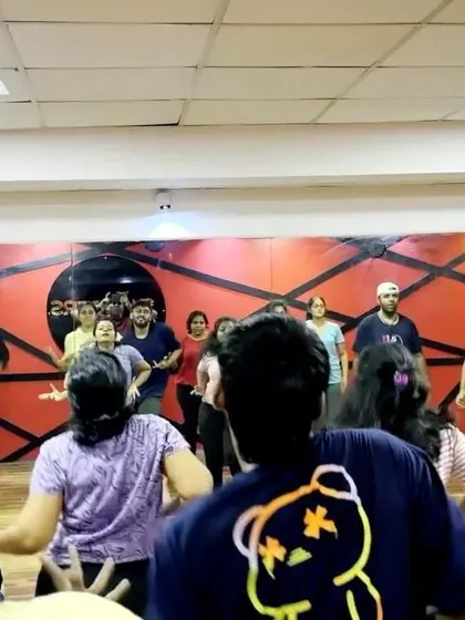 Another angle from our showcase rehearsals, showing the full scope of a large group practice session. Every student is focused and in sync.